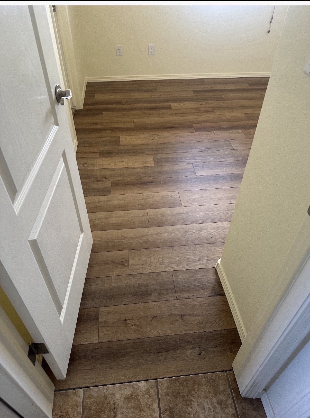 Hallway with hardwood flooring