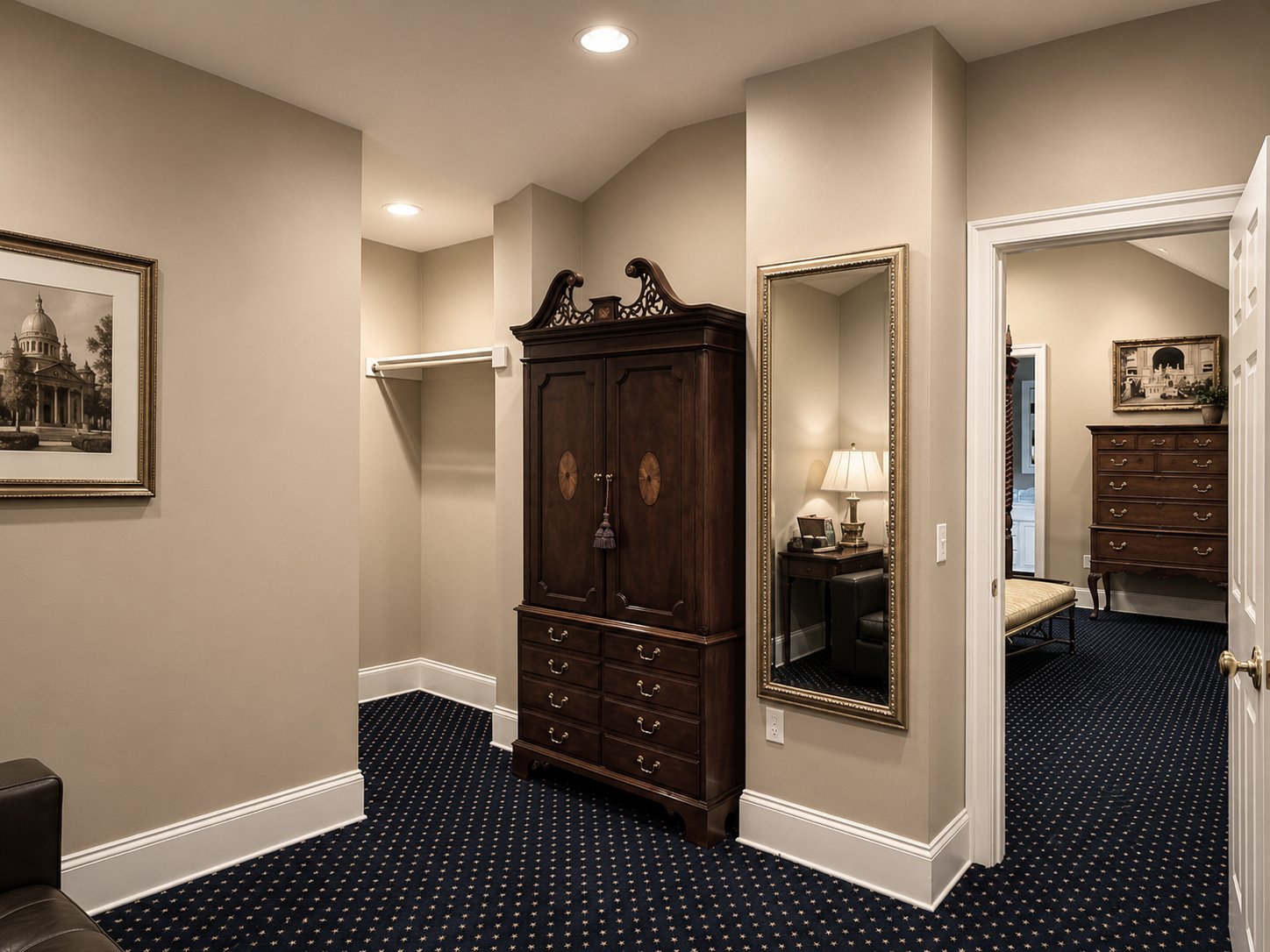 Elegant bedroom with a wooden armoire, mirror, and carpeted floor