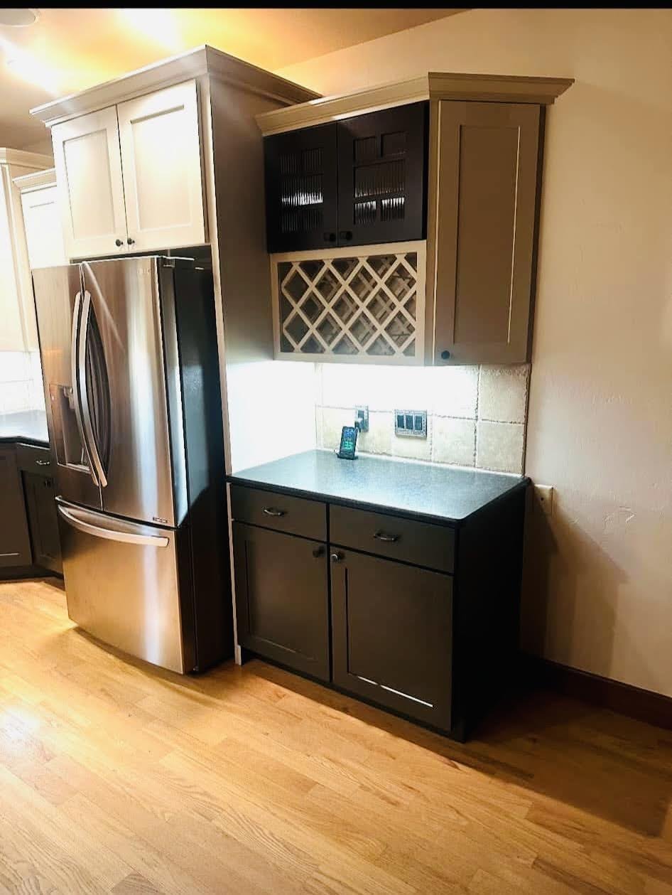 Kitchen with dark cabinets