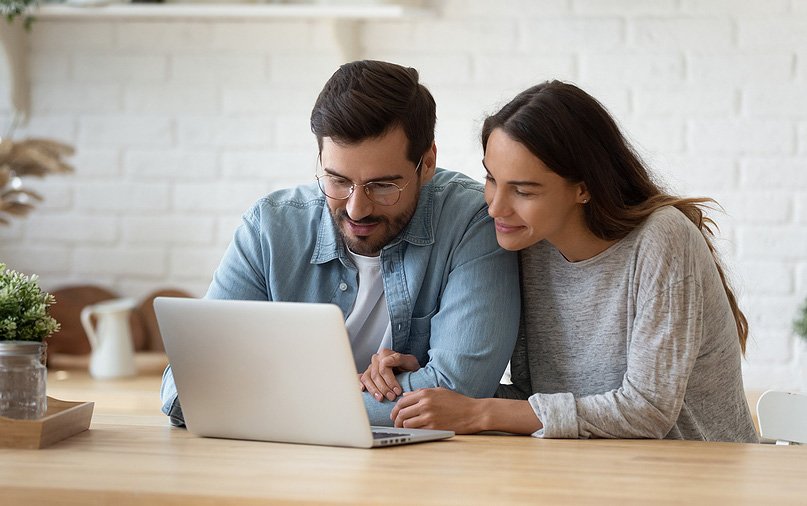 Couple reviewing Pocono home listings together