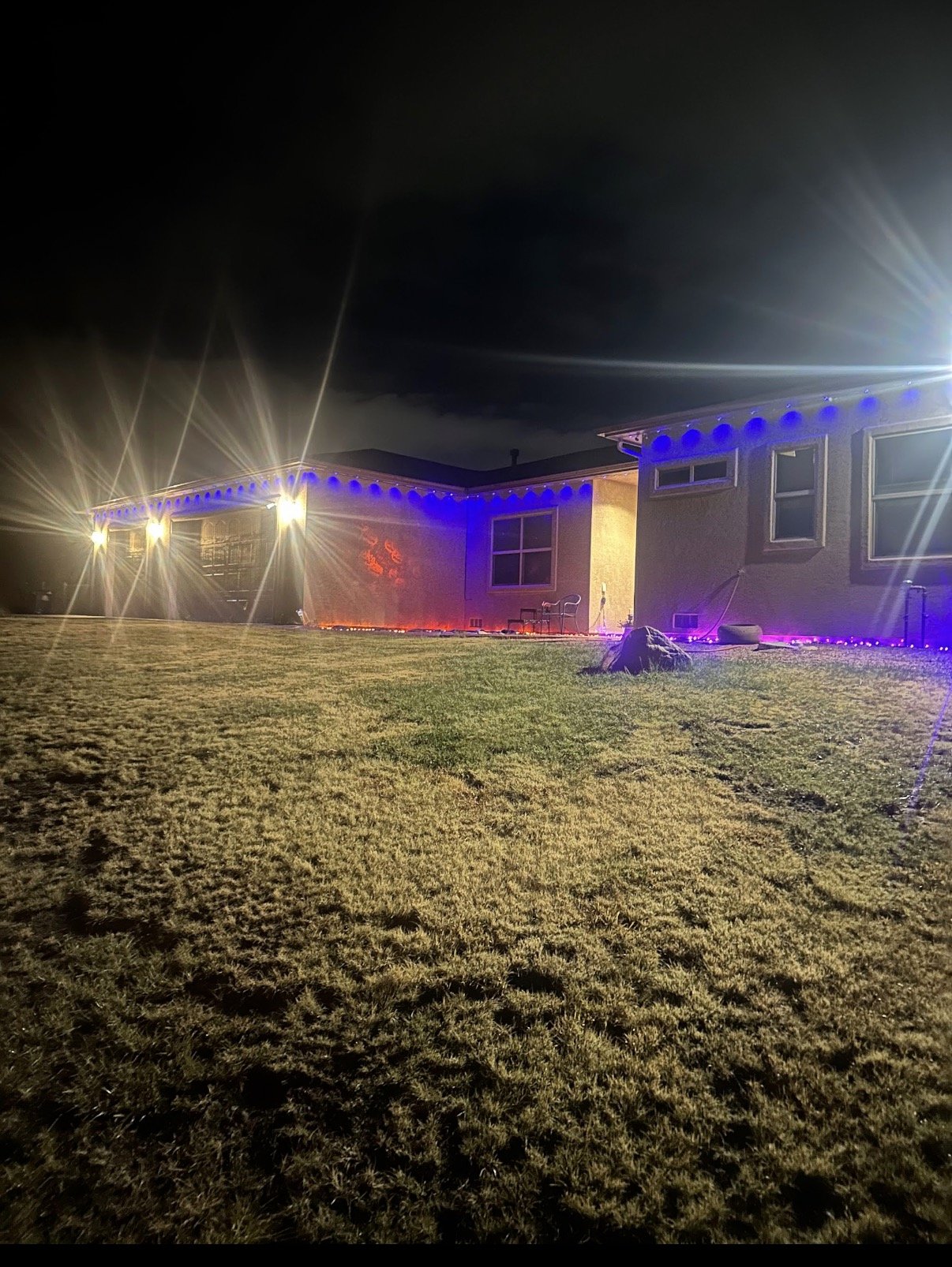 House with holiday lighting installation