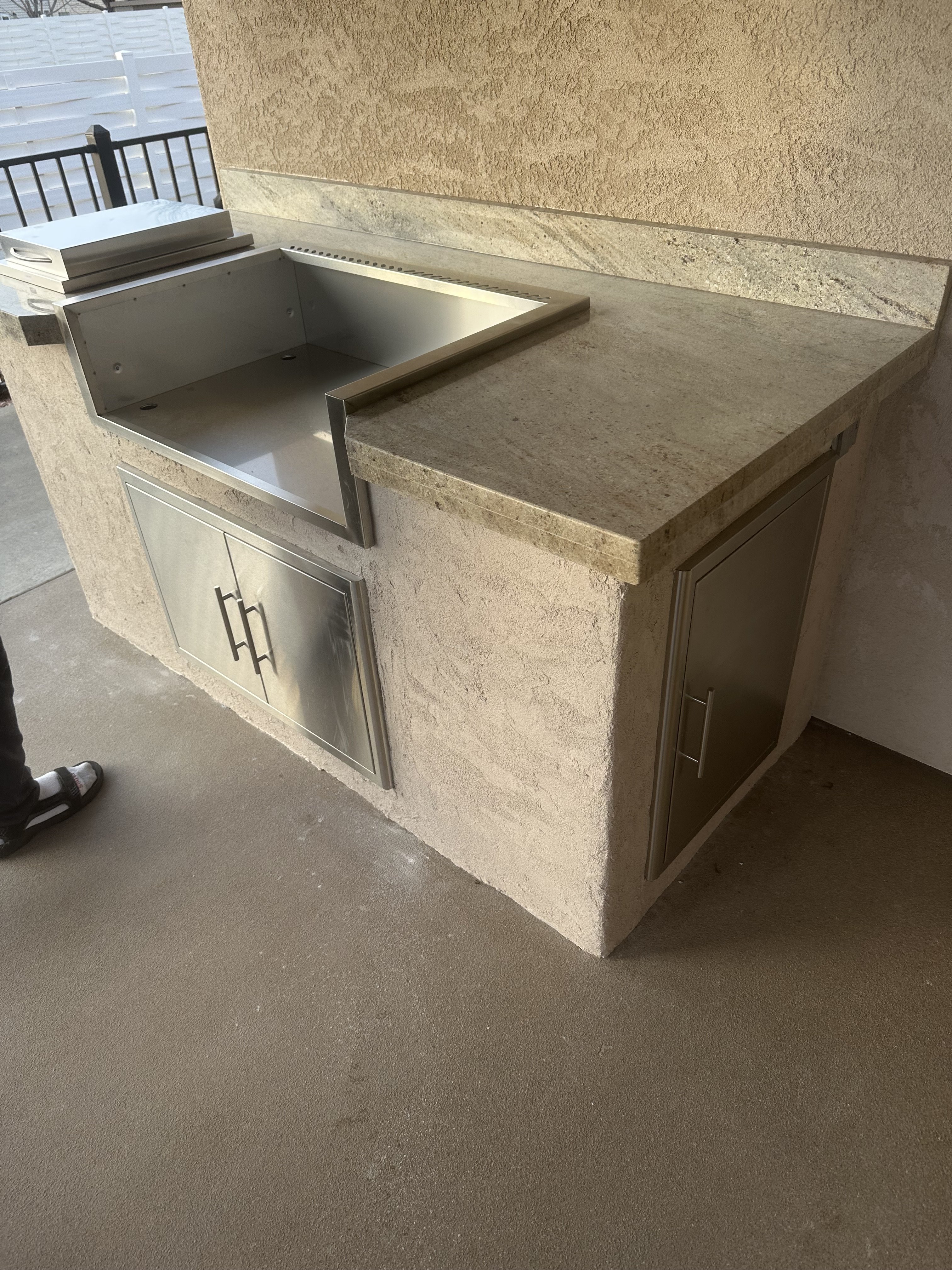 Stainless steel BBQ island with granite countertop in Orchard Mesa