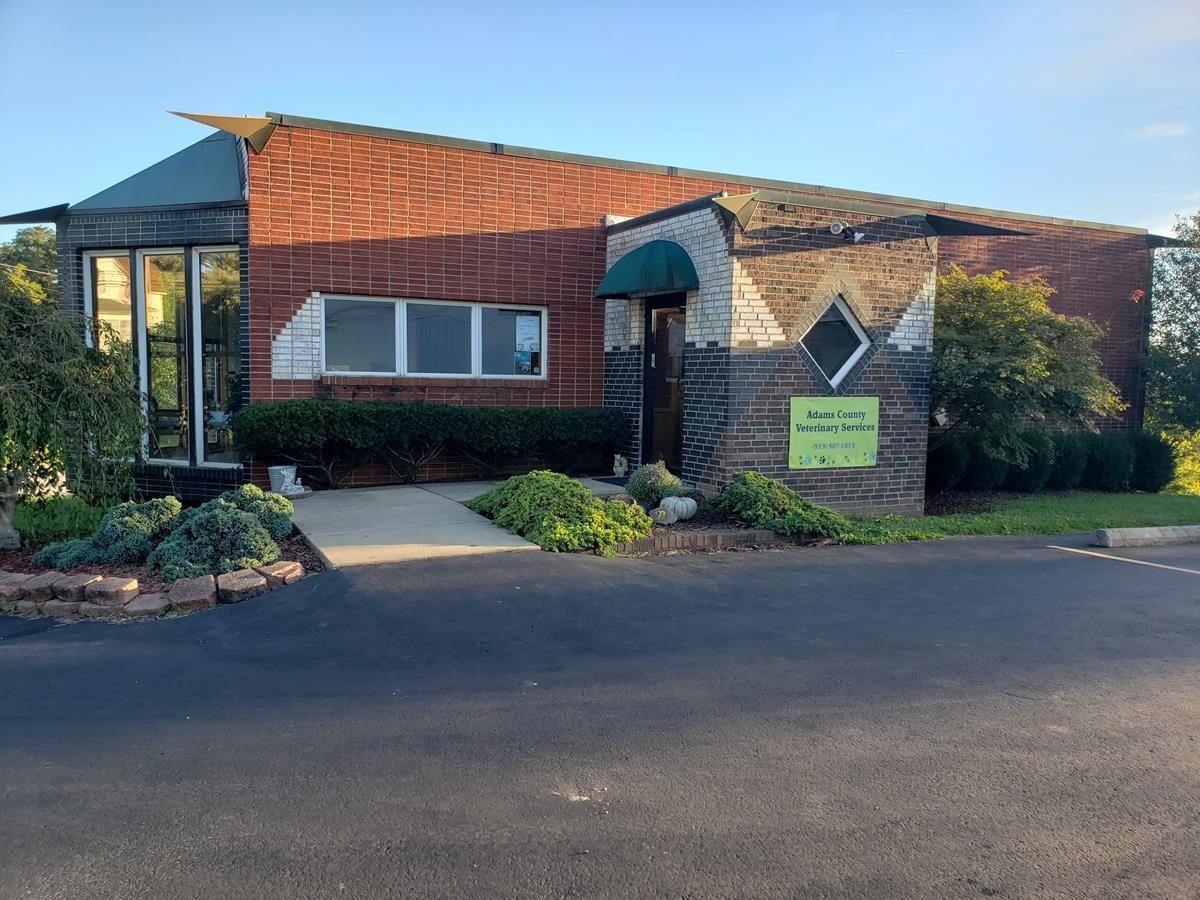 Adams County Veterinary Services building exterior with a sign and entrance