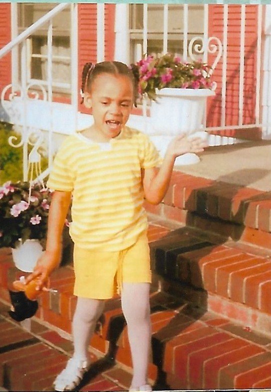Little girl in yellow outfit