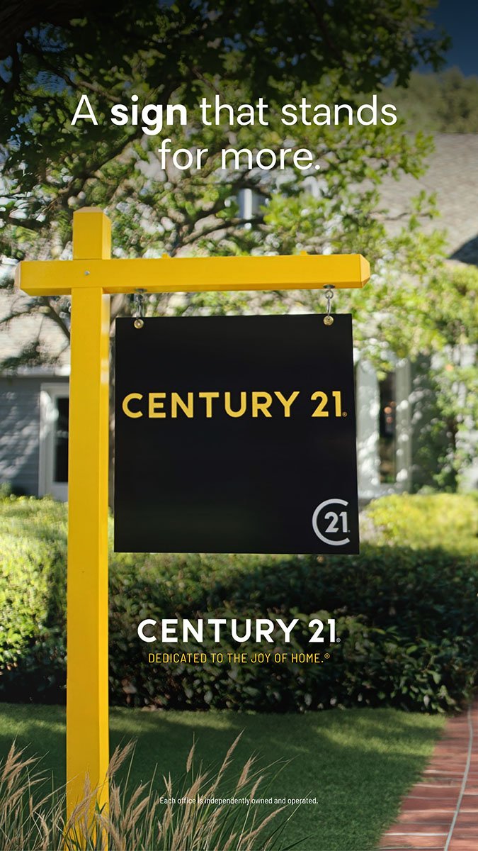 CENTURY 21 real estate sign in front of a Pocono home