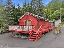 A charming red cabin in the Pocono Mountains
