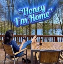 Relaxing on a deck with a lake view in the Poconos