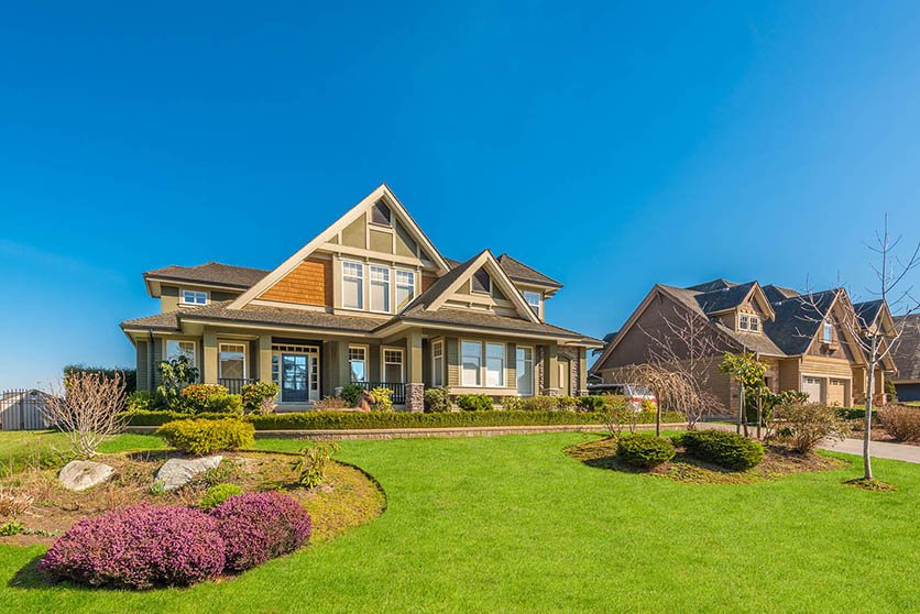 A large home with a manicured lawn and garden in McSherrystown, PA